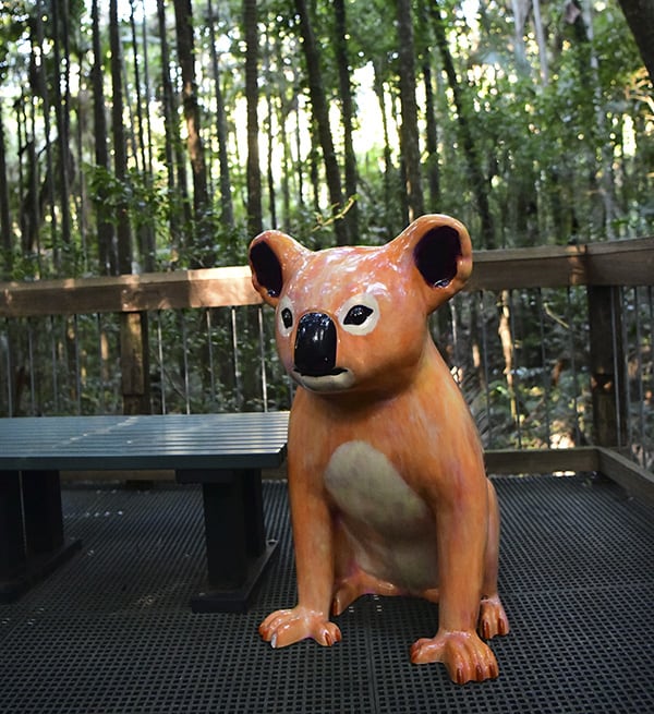 An orange-coloured koala sculpture on the Hello Koalas Sculpture Trail