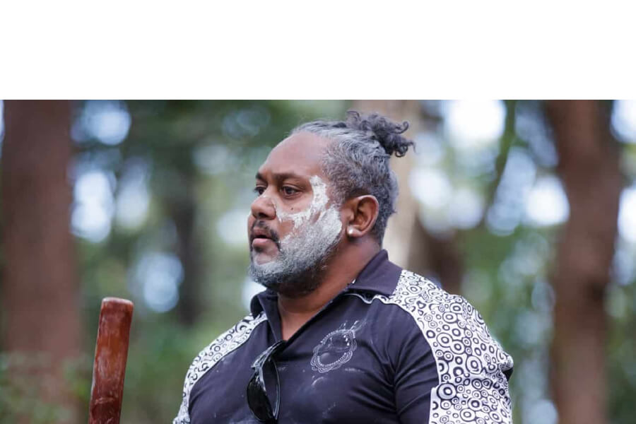 An Aboriginal man with face paint